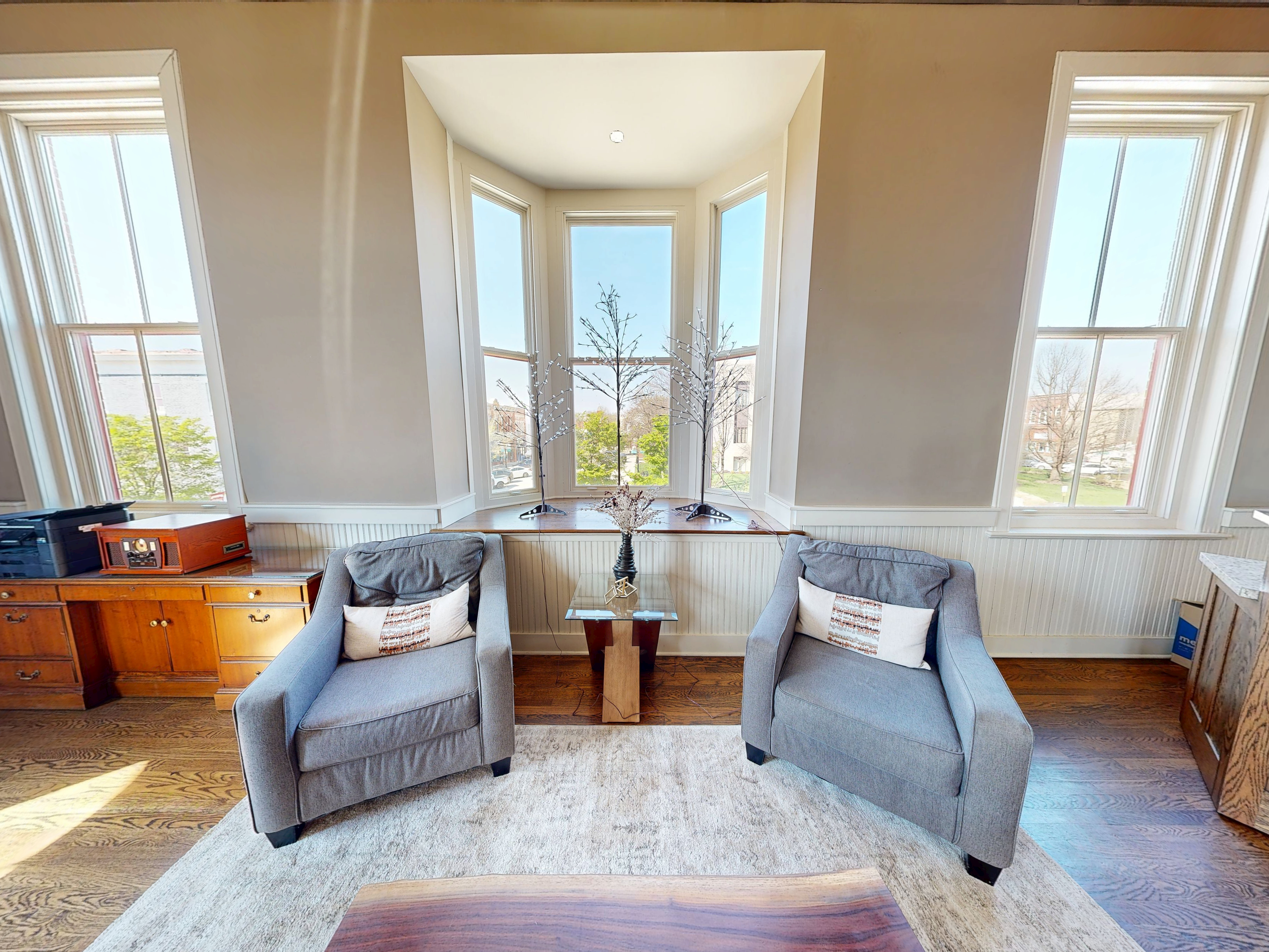 Soft lounge backdrop with tall windows
